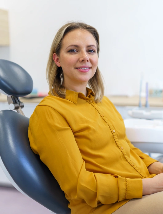 Beautiful Lady Seating Dentist Chair at River Rock Dental Office